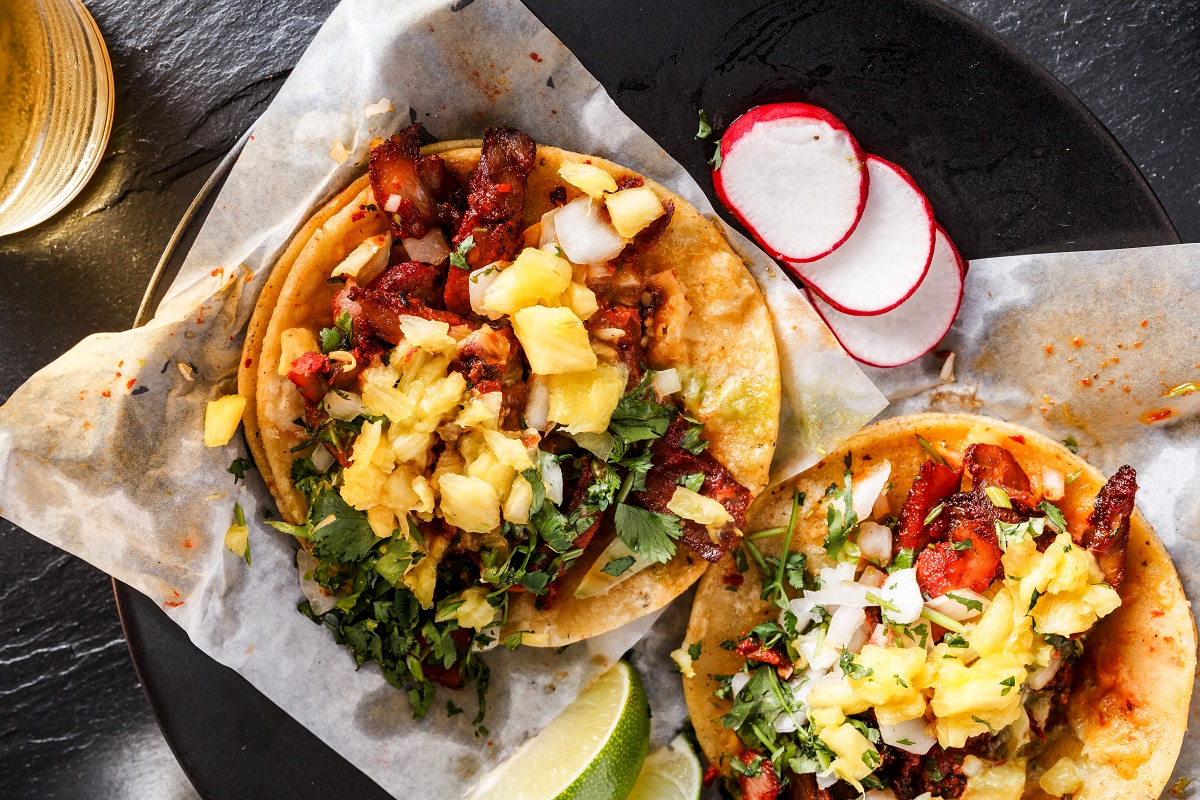 mexican al pastor street tacos overhead shot close up